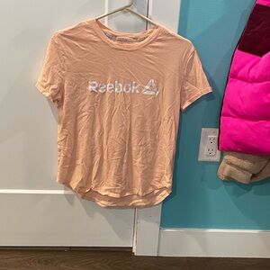 Orange reebok tee-shirt